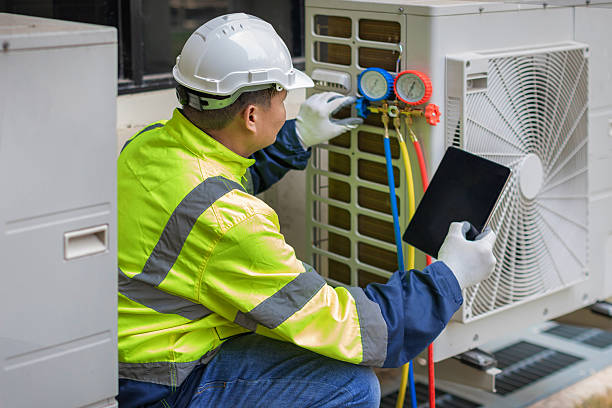 Professional Ductwork Repair technician working in Mequon, WI